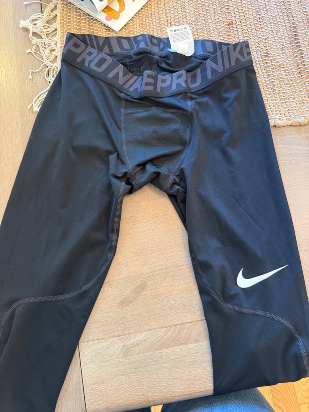 Nike Black Compression Leggings with White Swoosh